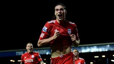 Andy Carroll celebrates scoring the winning goal.