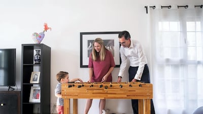 Jorge Camarate and wife Emma Ashworth with their two-year-old son Daniel at their rented villa in the Springs. The couple have taken advantage of the euro's decline by purchasing a property in Lisbon. Reem Mohammed / The National