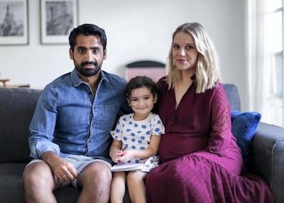 Jessica Smith at home in Dubai with her daughter, Ayla, and her husband, Hamid. Reem Mohammed / The National