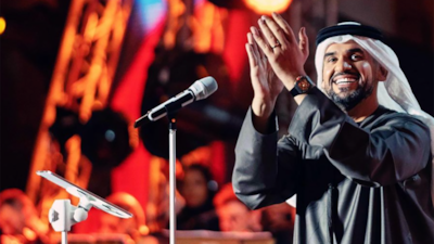Hussain Al Jassmi performs in Khor Fakkan on New Year's Eve 2023. Photo: Instagram / 7sainaljassmi