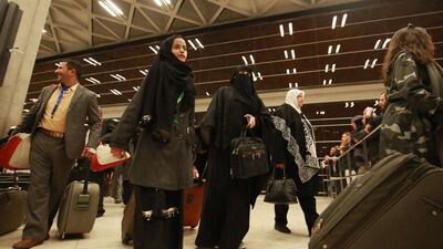 Yemeni children and their guardians arrive at Queen Alia International Airport, south of the Jordanian capital Amman, following a second United Nations medical evacuation from Sanaa. AFP
