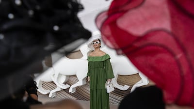 Hala Al Bouchi, wearing a white hat, poses for a photo at the Dubai World Cup