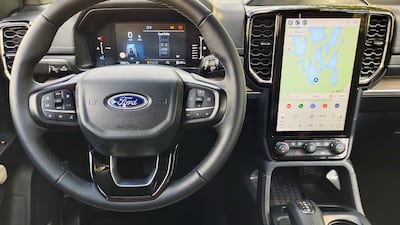 The car has a dedicated off-road screen with a 360-degree camera and information about pitch and roll