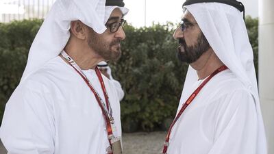 Sheikh Mohammed bin Rashid, Vice President and Ruler of Dubai, right, with Sheikh Mohammed bin Zayed, Crown Prince of Abu Dhabi and Deputy Supreme Commander of the UAE Armed Forces, left, at the Etihad Airways Abu Dhabi Grand Prix. Ryan Carter / Crown Prince Court — Abu Dhabi