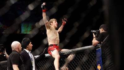Arnold Allen celebrates winning his fight against Dan Hooker. Reuters
