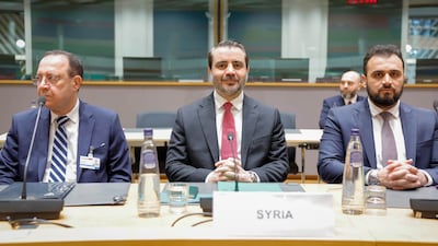 Syrian Foreign Minister Asaad Al Shibani, centre, at talks in Brussels on May 11. Photo: Syrian Foreign Ministry