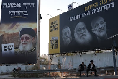 Election banners on display during a demonstration by ultra-Orthodox Jews protesting against mandatory recruitment into the Israeli military in Bnei Brak, August 24, 2006. EPA