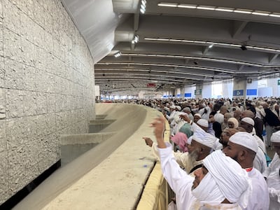 Pilgrims take part in the stoning ritual at the Jamarat pillar in Mina. AFP
