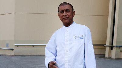 Mohammed Iqbal, a restaurant driver from Pakistan, talks about his financial concerns from living in Abu Dhabi. Ravindranath K / The National