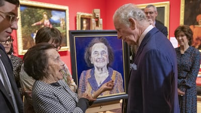 The Prince of Wales meets Lily Ebert, 98, at the Holocaust survivors' exhibition at the Queen's Gallery, Buckingham Palace. She showed him her Auschwitz prisoner tattoo.. PA