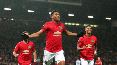 Manchester United's Anthony Martial, centre, after scoring the second. Getty