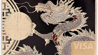 A picture of a dragon with encrusted diamonds on a gold plated card. Insignia has created fewer than 100 Jewelled cards for clients across the UK, Middle East, Monaco, Russia and US cardholders, who pay a $10,000 annual fee. Courtesy Insignia Group