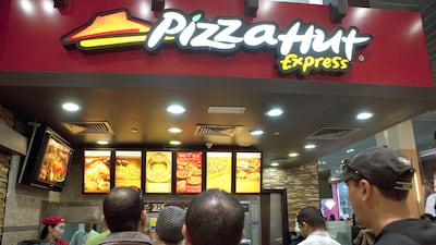 Americana owns the exclusive rights to the KFC and Pizza Hut franchises across the Middle East. Jaime Puebla / The National