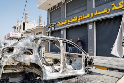 A burnt-out car after the Israeli settlers' rampage in Hawara, in the Israeli-occupied West Bank. Reuters