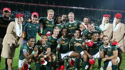 South Africa players celebrate after winning the 2014 Dubai Sevens tournament. Pawan Singh / The National / November 29, 2014