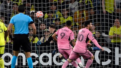 Inter Miami forward Luis Suarez heads home the late leveller against Nashville. AP