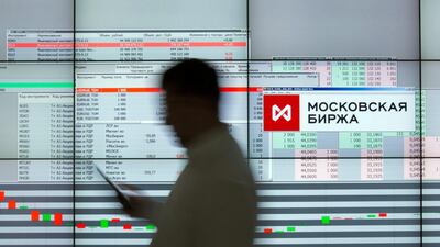A visitor passes the OAO Moscow Exchange in Russia. Russia's equity market performed the best globally on a total-return basis in dollar terms. Bloomberg