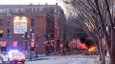 Debris litters the road near the site of an explosion in the area of Second and Commerce in Nashville. Tennessean.com / USA TODAY NETWORK via Reuters