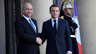 French President Emmanuel Macron shakes hands with Iraqi's President Barham Saleh upon his arrival for their meeting at the Elysee Palace in Paris, France, 25 February 2019. EPA