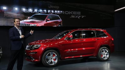 Jim Morrison, the director of Jeep brand product marketing, unveils the Grand Cherokee SRT at the Auto Expo in India. Tsering Topgyal / AP Photo