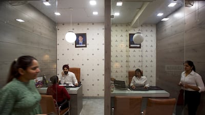 The service at immigration consultancies such as Broadway Immigration Service in Jalandhar costs about 100,000 rupees ($1,200)