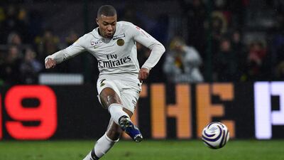 Seventh heaven: Mbappe's permanent transfer to PSG was made official before the start of the ongoing season and the teenager was handed the No 7 shirt vacated by Lucas Moura. AFP