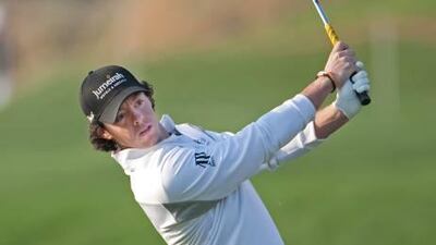 Rory McIlroy produced a steady round to share the lead on The National Course.