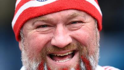 A Stoke City supporter smiles before the Premier League match against West Brom at The Hawthorns on Saturday. Richard Heathcote / Getty Images