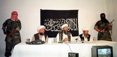 Terrorists Osama bin Laden, centre, and Ayman Al Zawahiri, left, address a news conference May 26, 1998 in Afghanistan. Getty