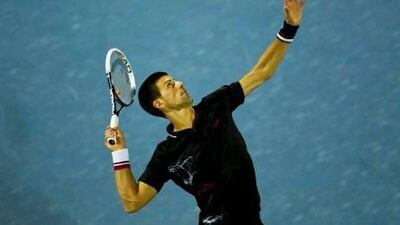 Novak Djokovic of Serbia serves to Cedrik-Marcel Stebe of Germany during the first round.