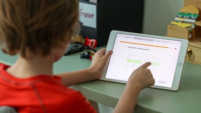 A pupil studying remotely in Dubai. For older children, this is their second experience of having to transfer their learning online. Chris Whiteoak / The National