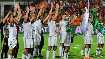 Algeria's players celebrate at the final whistle. AFP