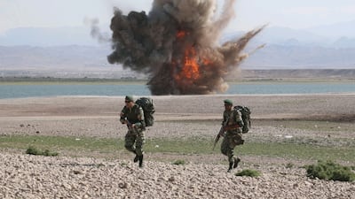 A handout photo made available by the Iranian Army office shows an explosion during a military exercise by the Iranian Army in the north-west of Iran, close to the border with Azerbaijan, 01 October, 2021. Iran is holding a military exercise near the Iran-Azerbaijan border in north west of the country. EPA / IRANIAN ARMY HANDOUT HANDOUT EDITORIAL USE ONLY / NO SALES