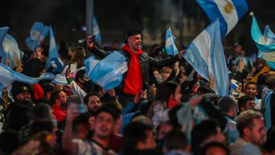 Argentina fans celebrate the Copa America champions' title of the national soccer team at the Obelisco national monument in Buenos Aires, Argentina, 10 July 2021. Argentina beat Brazil 1-0 in the final to win Copa America, its first major title in 28 years. EPA / JUAN IGNACIO RONCORONI