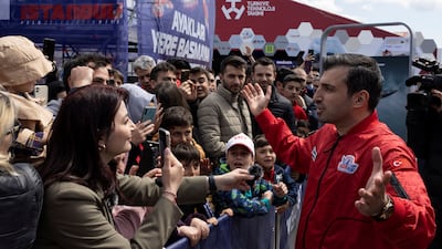 Selcuk Bayraktar, chairman of Turkish defence firm Baykar, chats with visitors at Teknofest air show in Istanbul last week. Reuters