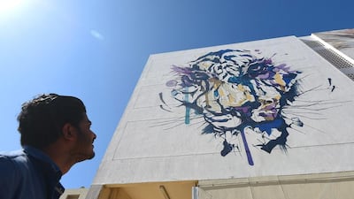 Artists from around the world have been involved in transforming some of the buildings along 2nd December Street in Satwa into giant canvasses in recent weeks as part of the Dubai Street Museum project. Tom Dulat / Getty Images