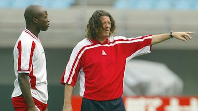 Senegal national soccer team coach French Bruno Metsu (R) Masterminded Senegal’s shock win against holders France in 2002; managed the UAE, Al Ain - both with success - and Al Wasl. AFP PHOTO / PATRICK HERTZOG