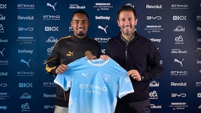 Allan Elias, alongside director of football Hugo Viana, after completing his move to Manchester City. Photo: Manchester City FC