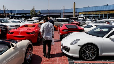 Data shows a decline in consumer demand for luxury cars. Antonie Robertson / The National