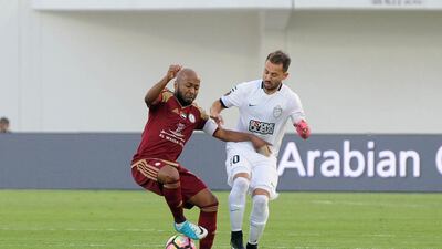 Everton Ribeiro, right, scored the winning goal for Al Ahli against Al Wahda. Courtesy AGL