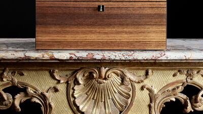 Each bag is presented in a lacquered eucalyptus wood coffer