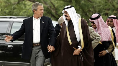 Then US President George W Bush greets King Abdullah, then the Saudi Crown Prince at his ranch in Crawford, Texas. Gerald Herbert / AP Photo