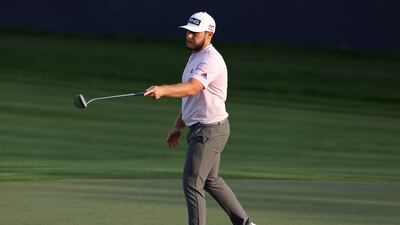 Tyrrell Hatton of England reacts to a putt on the 18th during day three of the Slync.io Dubai Desert Classic at Emirates Golf Club. Getty