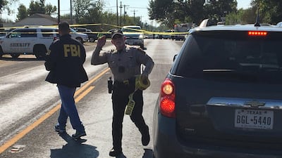 FBI officials arrive at the site of a mass shooting in Sutherland Springs, Texas, U.S., November 5, 2017, in this picture obtained via social media. MAX MASSEY/ KSAT 12/via REUTERS THIS IMAGE HAS BEEN SUPPLIED BY A THIRD PARTY. MANDATORY CREDIT. NO RESALES. NO ARCHIVES