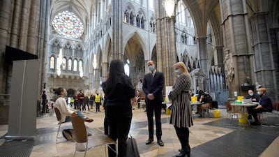 Prince William speaks to staff during a visit to the Covid-19 vaccination centre at Westminster Abbey in 2021