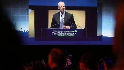 David Scowsill, the chief executive of the WTTC, gives the opening address at the council's global summit in Abu Dhabi yesterday. Delores Johnson / The National