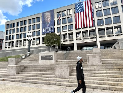 President Donald Trump's face looms over the Department of Labour in Washington on October 2, 2025. Thomas Watkins / The National