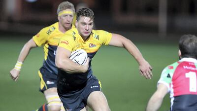Hurricanes' Stuart Jordan is tackled. Chris Whiteoak/The National