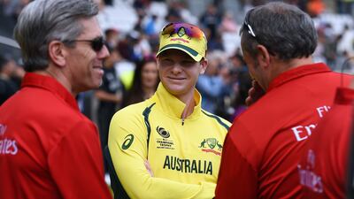 Australia captain Steve Smith prepares to lead his team out for the ICC Champions trophy cricket match between Australia and New Zealand at Edgbaston in Birmingham on June 2, 2017.