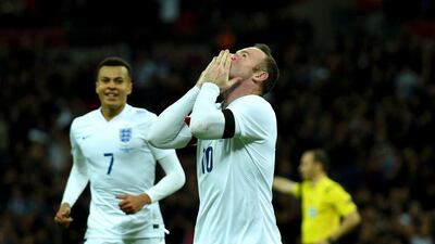Wayne Rooney celebrates scoring his team’s second goal. Shaun Botterill / Getty Images